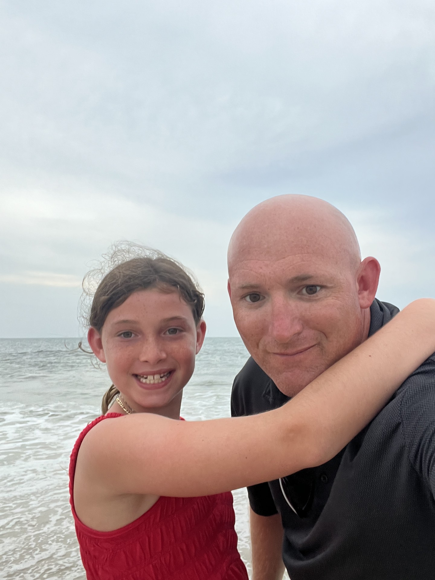 Founder of Southern Peak Systems with his daughter at the beach